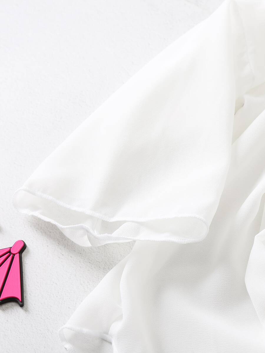 White ruffle kimono cover-up for tween girls, semi-sheer swimwear layer with three-quarter sleeves and regular length.