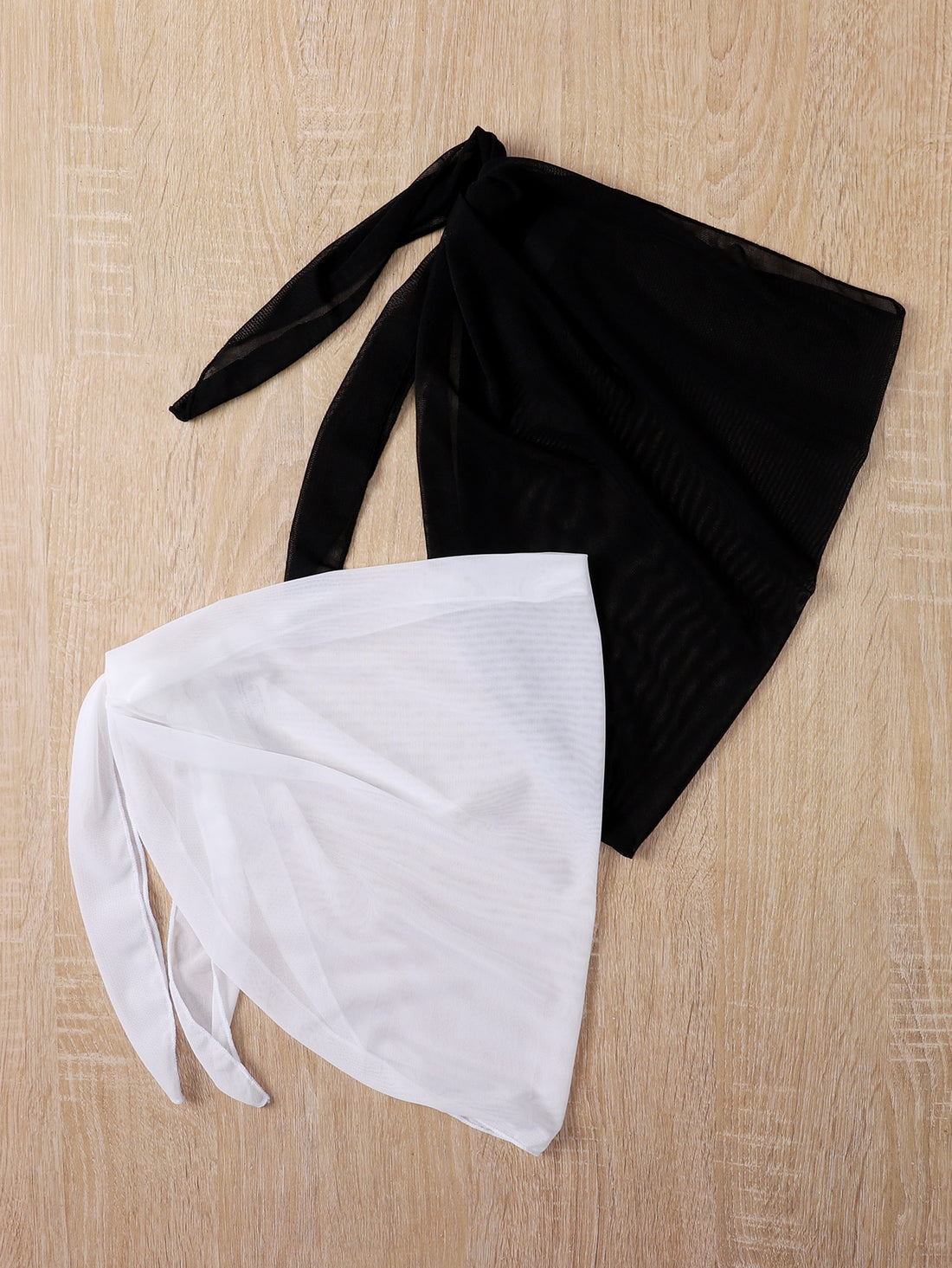 Girls' black and white 2-piece swimsuit cover up set featuring a long semi-sheer mesh skirt and matching shawl for beach vacation wear.