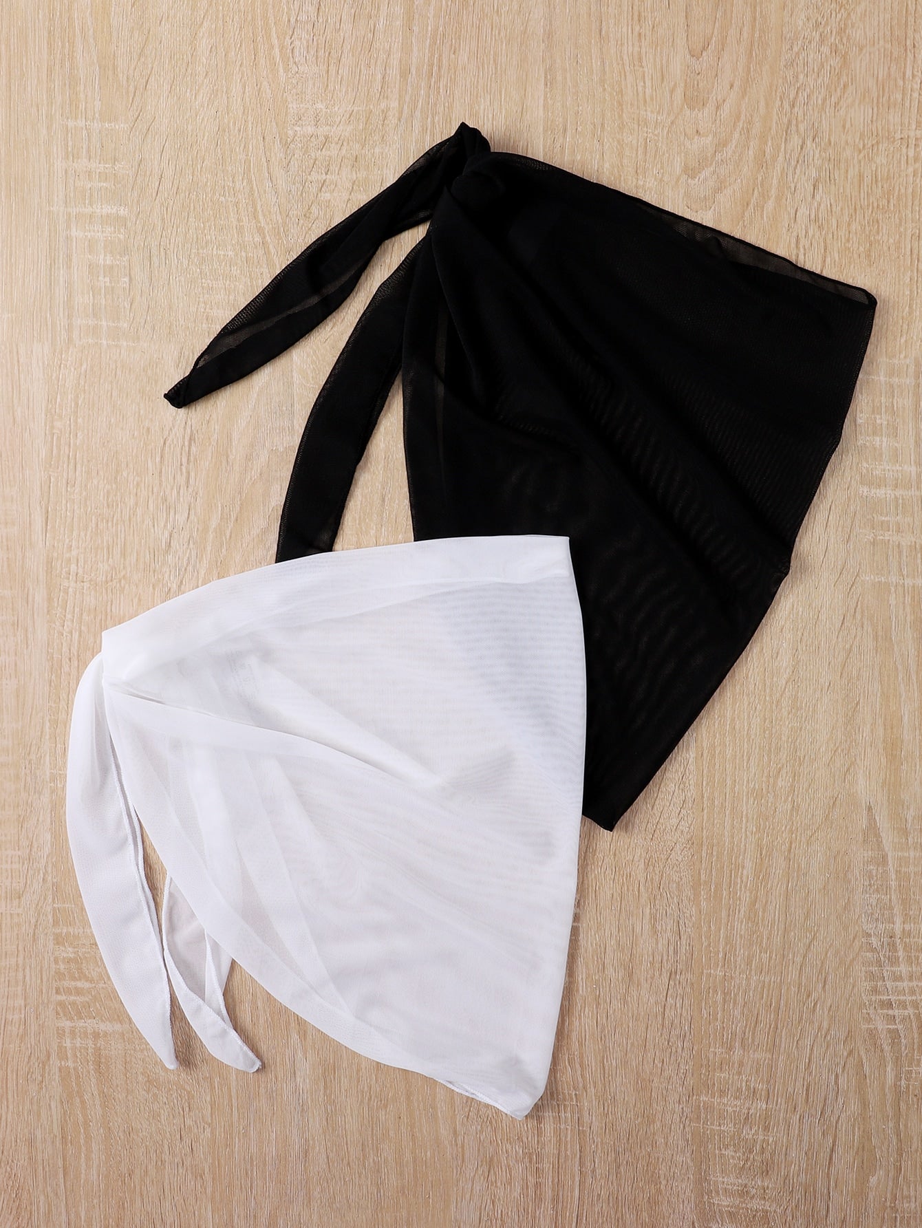 Girls' black and white 2-piece swimsuit cover up set featuring a long semi-sheer mesh skirt and matching shawl for beach vacation wear.
