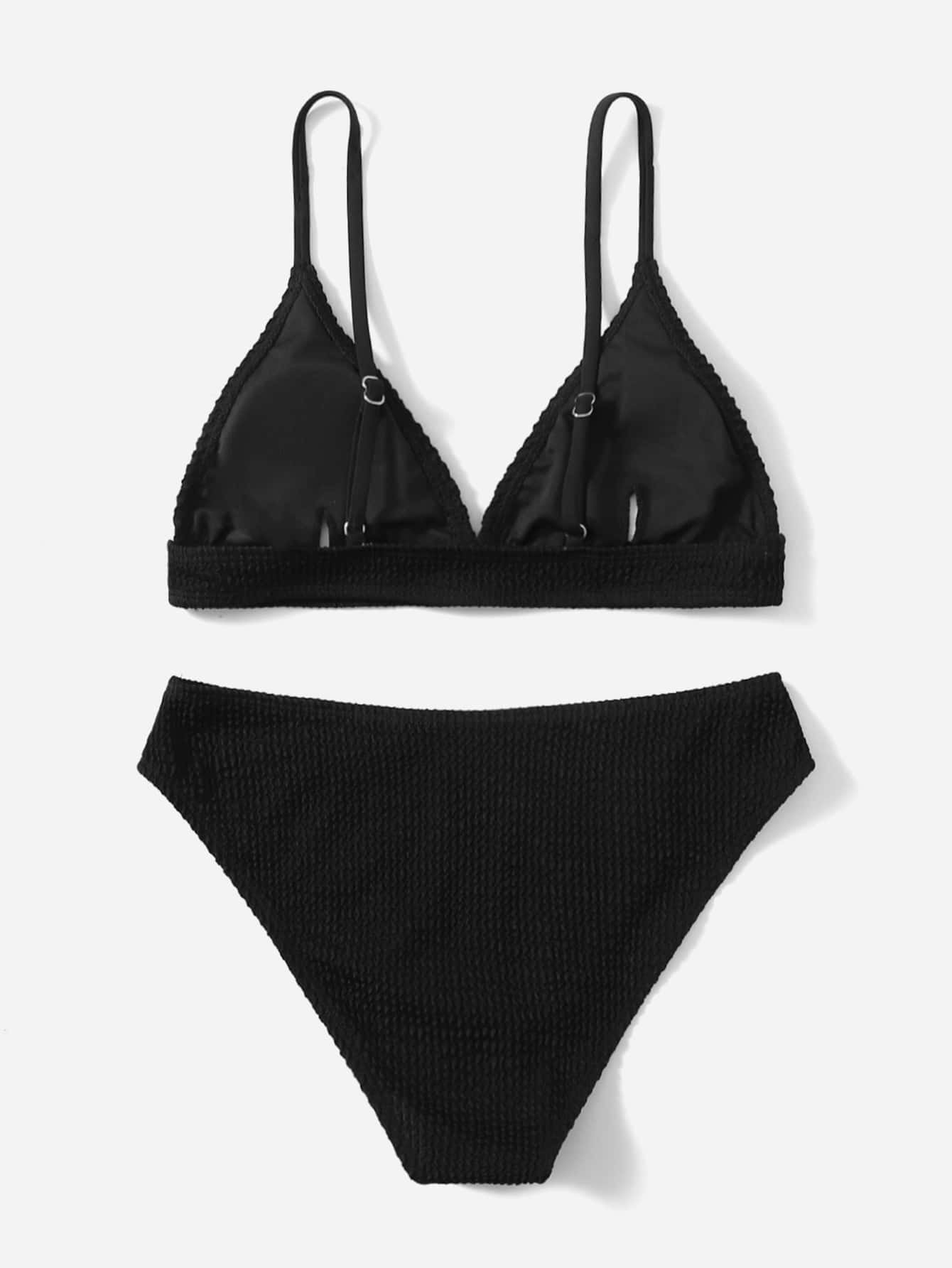 Tween girls two-piece bikini swimwear set with a solid color textured design, spaghetti strap top, wireless bra, and mid-waist lined bikini bottoms.