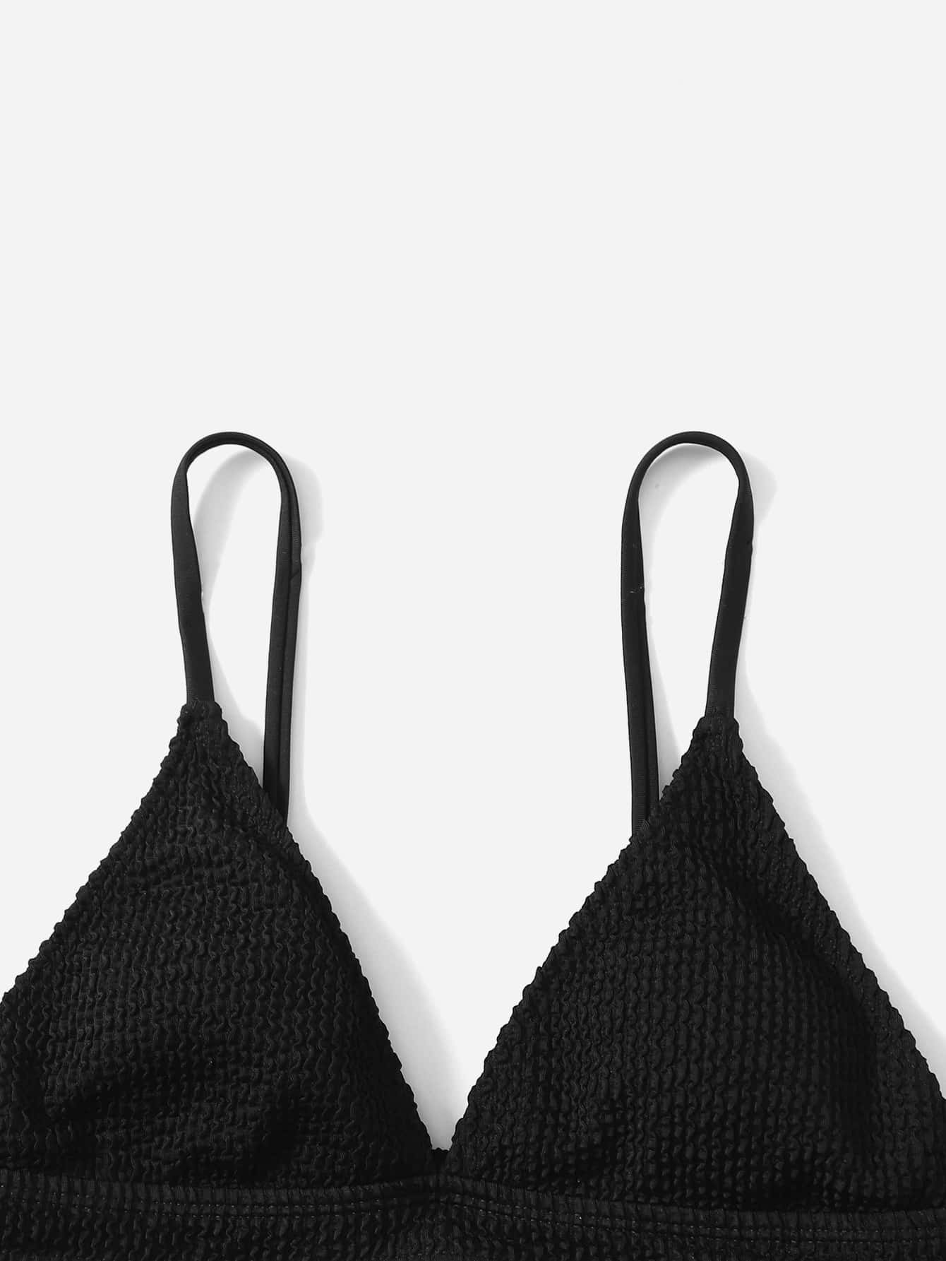 Tween girls two-piece bikini swimwear set with a solid color textured design, spaghetti strap top, wireless bra, and mid-waist lined bikini bottoms.