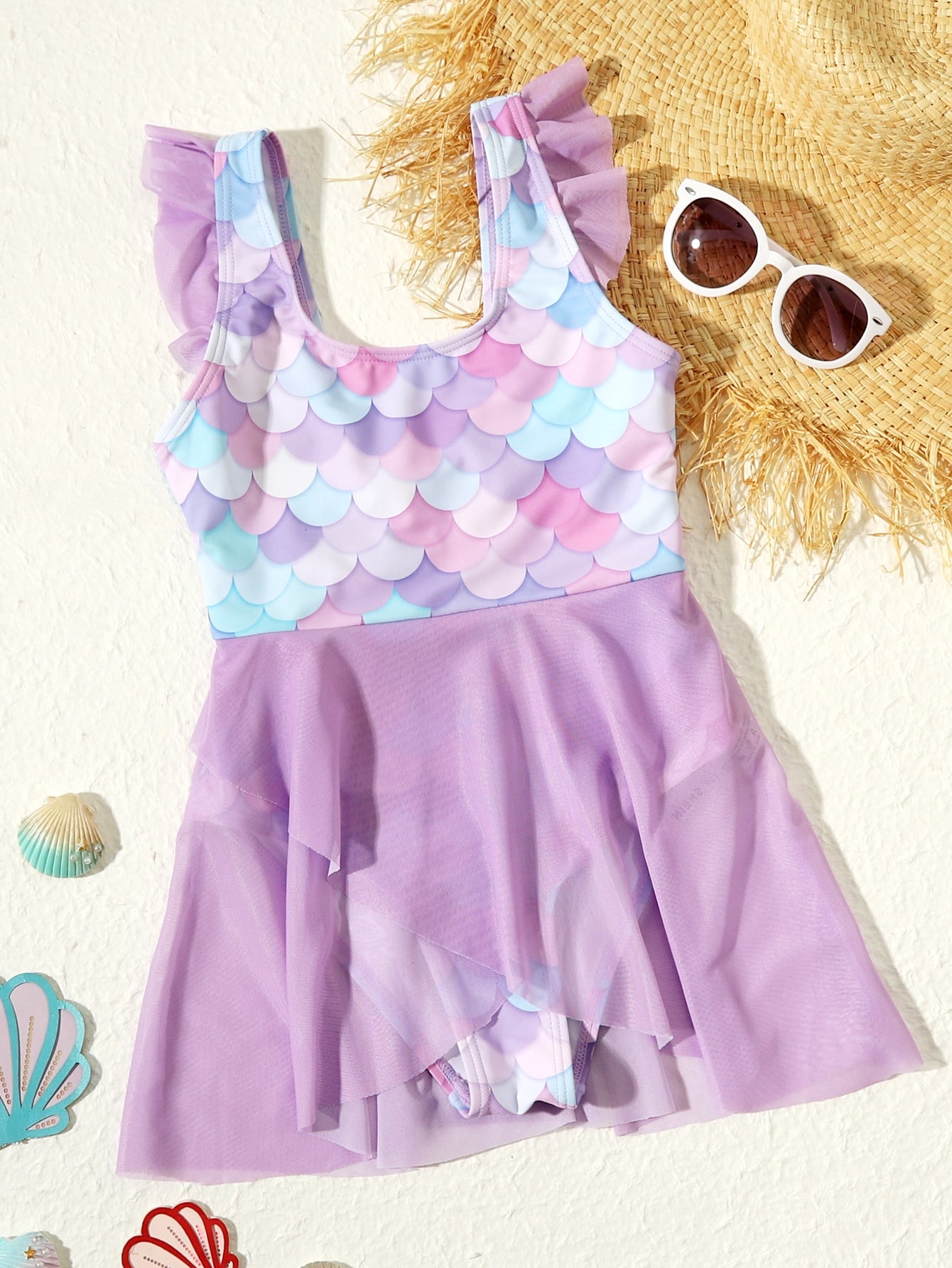 Tween girl one-piece swimsuit with multicolor fish scale graphic print, ruffle details, contrast mesh, round neck, and skirt bottom for beach or pool wear