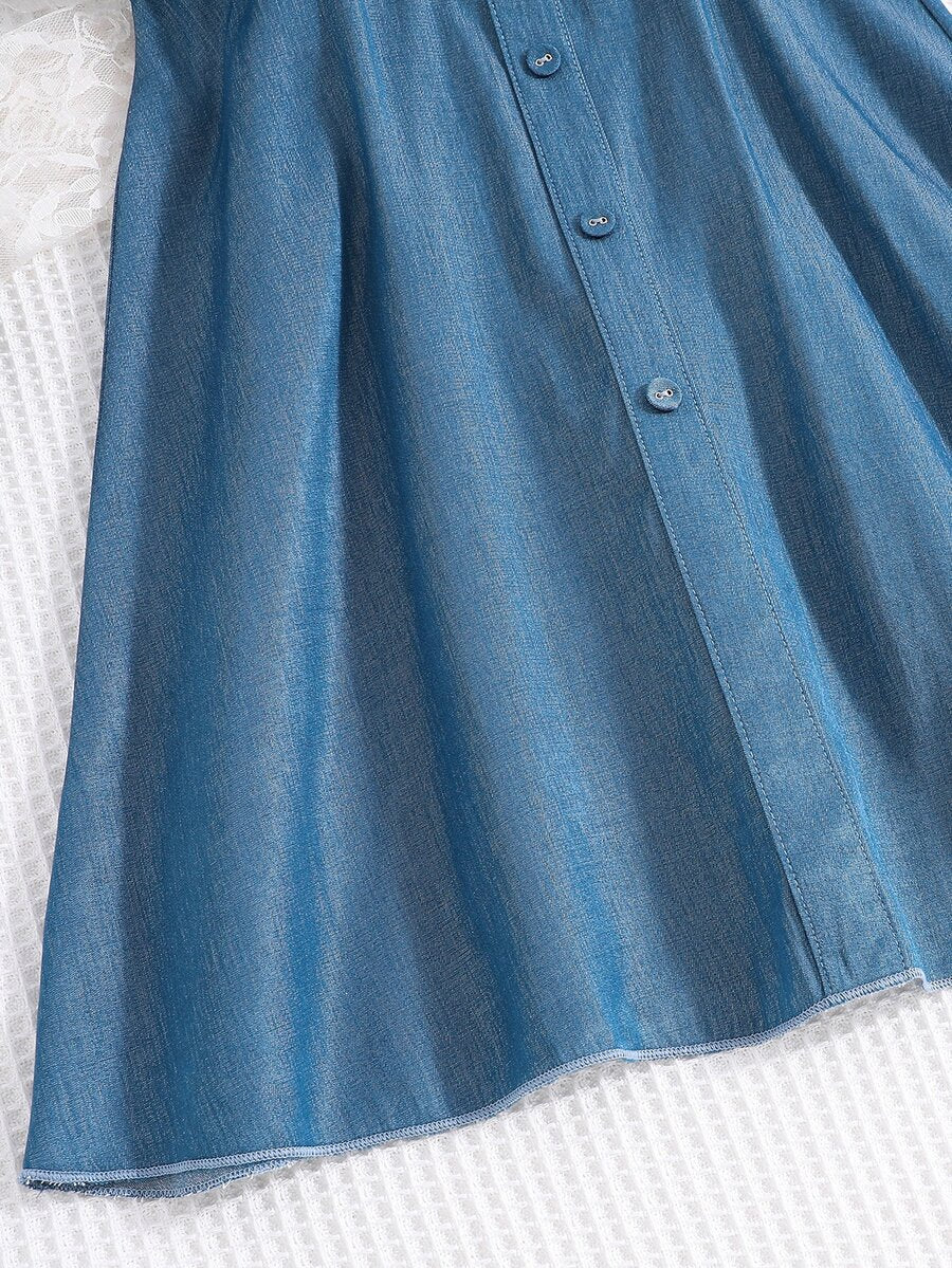 Vintaside tween girls sleeveless blue A-line dress featuring ruffle trim, square neckline, button front, and shirred back.