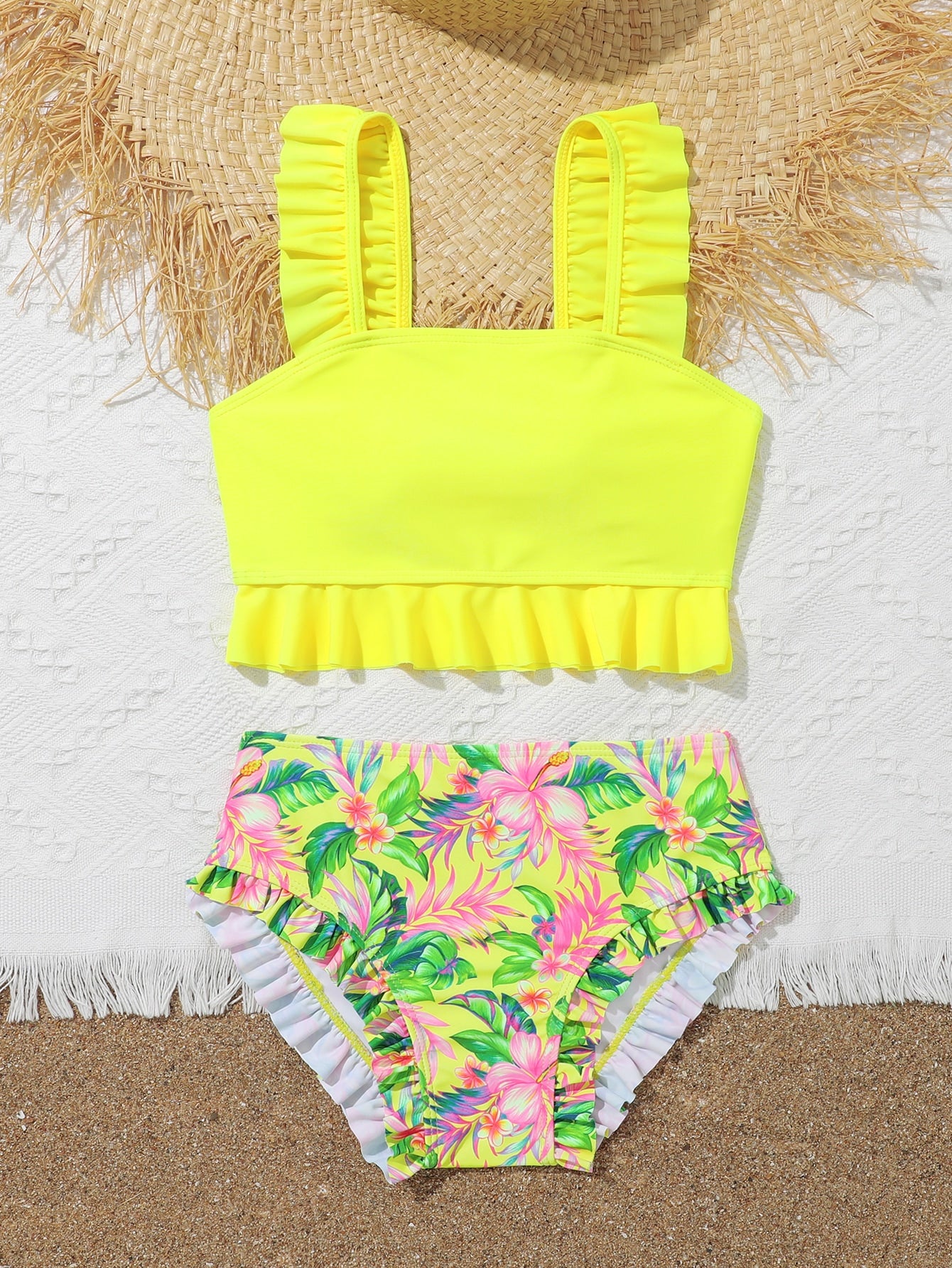 Tween girls solid color 2-piece bikini swimwear set with ruffle detail, strap neckline, wireless bikini top, and triangle mid-waist bikini bottoms; textured pattern with lined bottoms and high-stretch fabric, suitable for summer vacation.