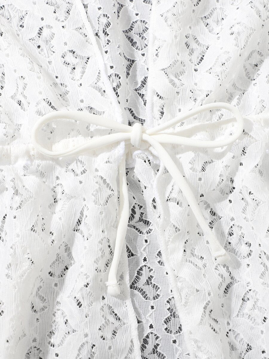 White tween girls sheer mesh kimono with ruffle hem, tie front, short sleeves, and short length for summer holiday beachwear.
