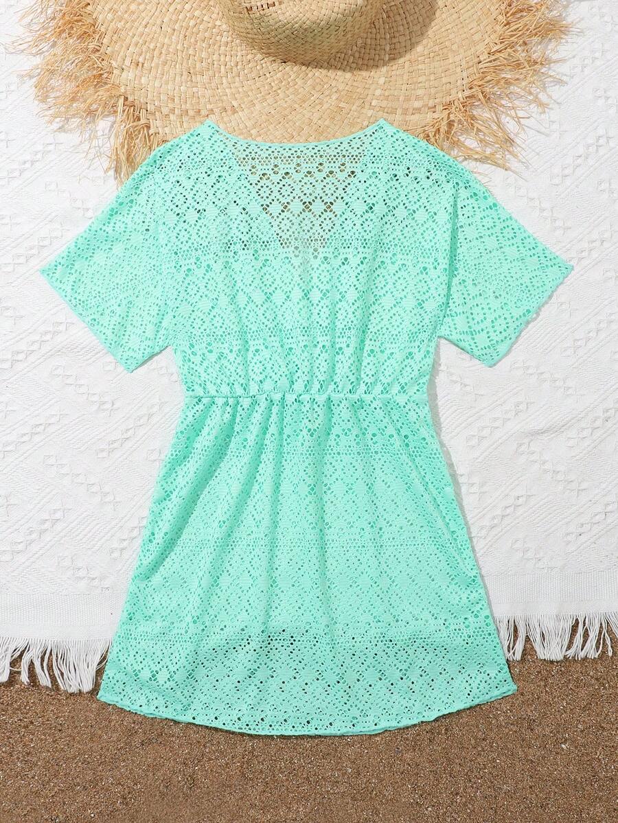 Girls long black beach cover-up dress with V-neck, short sleeves, sheer polyester fabric, contrast sequin detail, and zipper