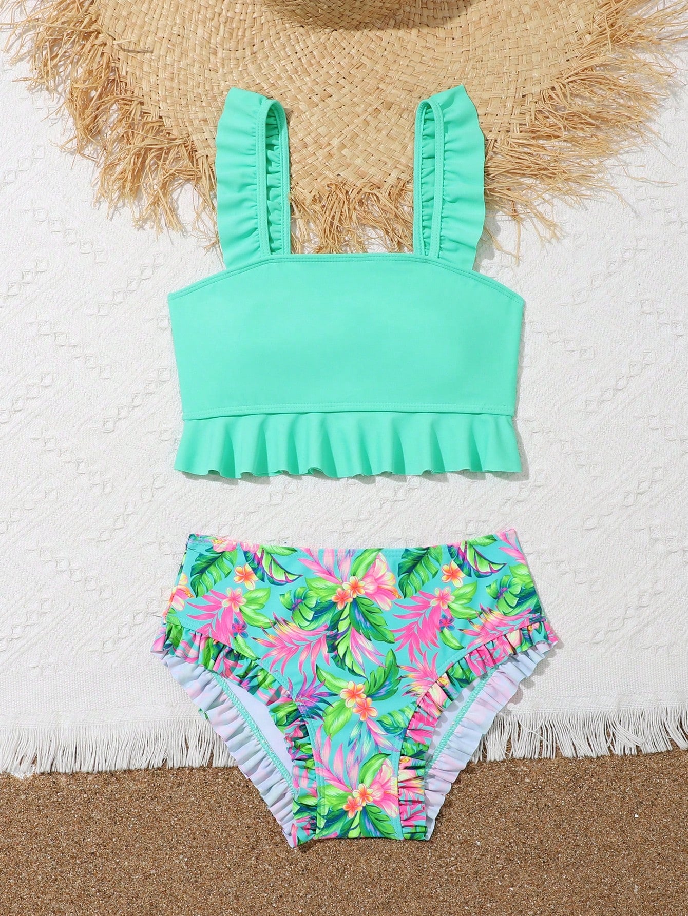Tween girls solid color 2-piece bikini swimwear set with ruffle detail, strap neckline, wireless bikini top, and triangle mid-waist bikini bottoms; textured pattern with lined bottoms and high-stretch fabric, suitable for summer vacation.