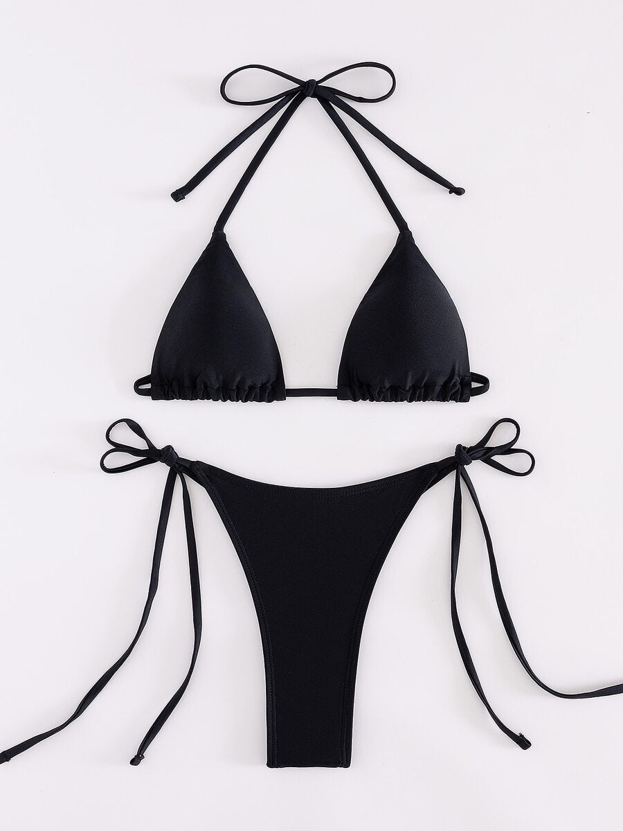Women's two-piece bikini swimwear featuring a halter neck push-up top with tie-back details and low-waist tie-side swimsuit bottoms.
