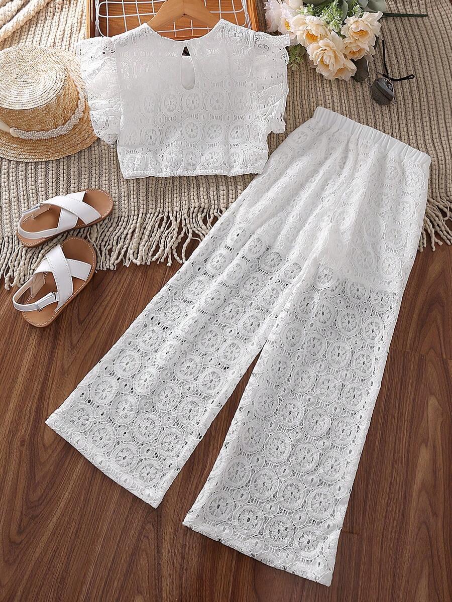 White 2-piece summer outfit set for tween girls featuring a sleeveless round neck ruffle trim lace top and matching cropped pants.