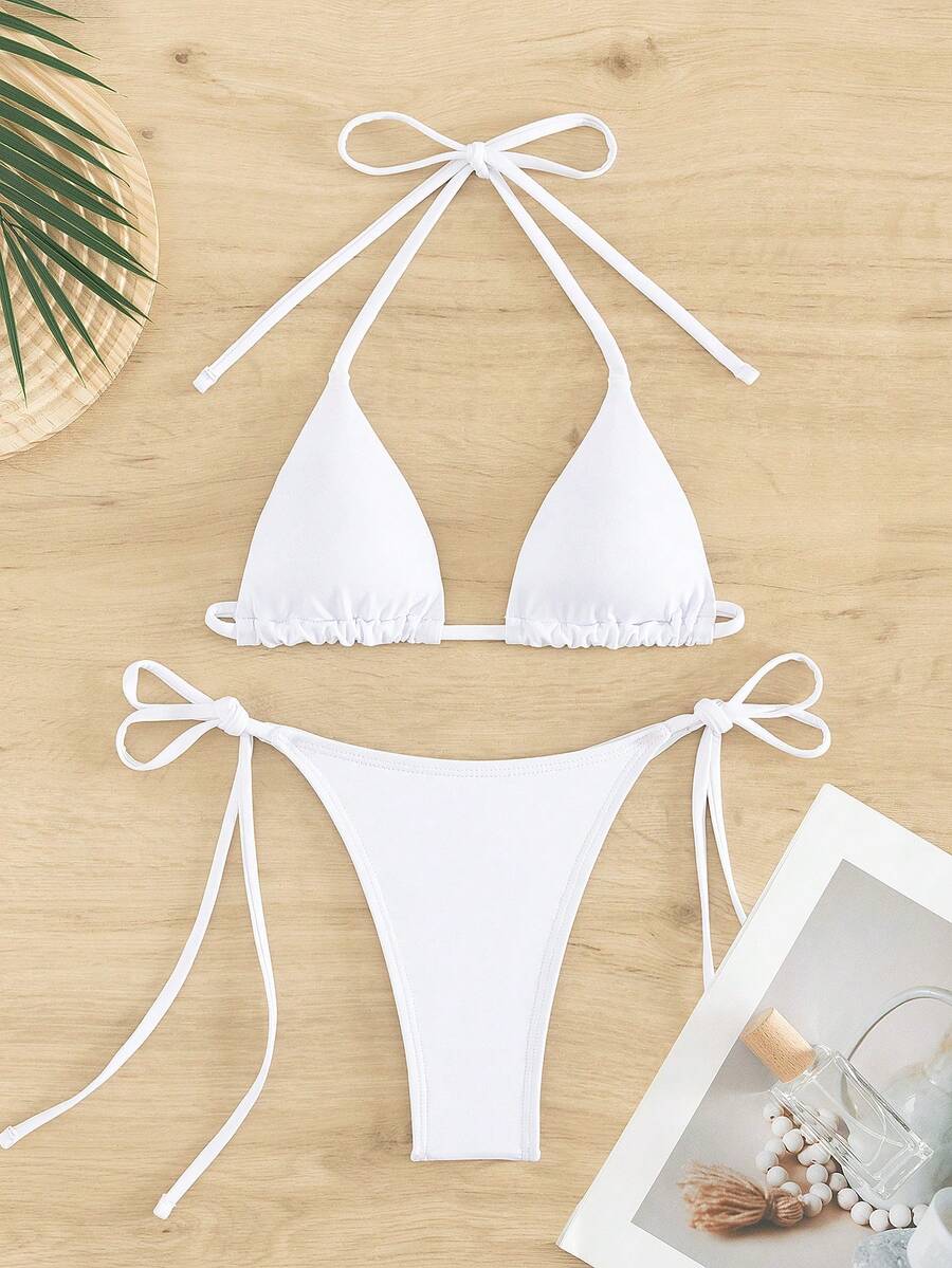 Women's two-piece bikini swimwear featuring a halter neck push-up top with tie-back details and low-waist tie-side swimsuit bottoms.