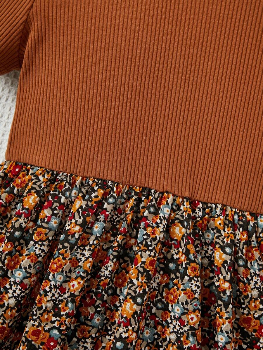 Tween girl wearing an apricot short sleeve A-line dress featuring a round neck, high waist with a belt, and flared hem.