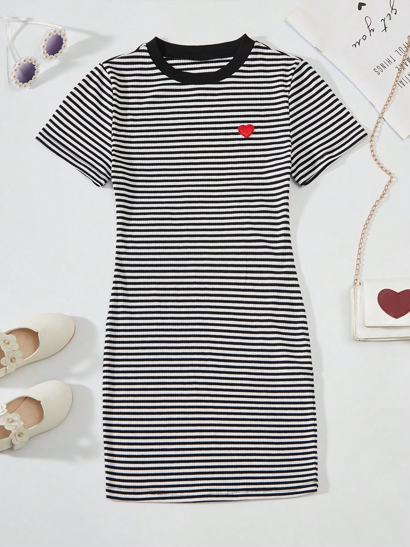 Girls black striped midi dress featuring short sleeves, round neck, slim fit, and flared hem.