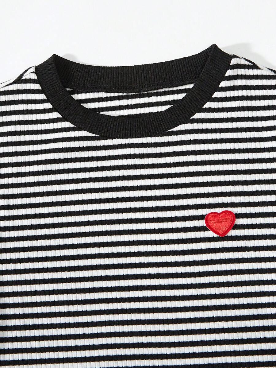 Girls black striped midi dress featuring short sleeves, round neck, slim fit, and flared hem.