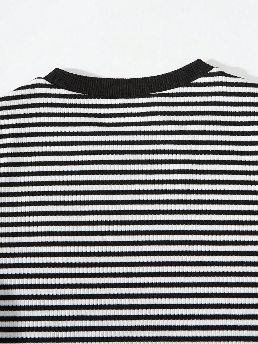 Girls black striped midi dress featuring short sleeves, round neck, slim fit, and flared hem.