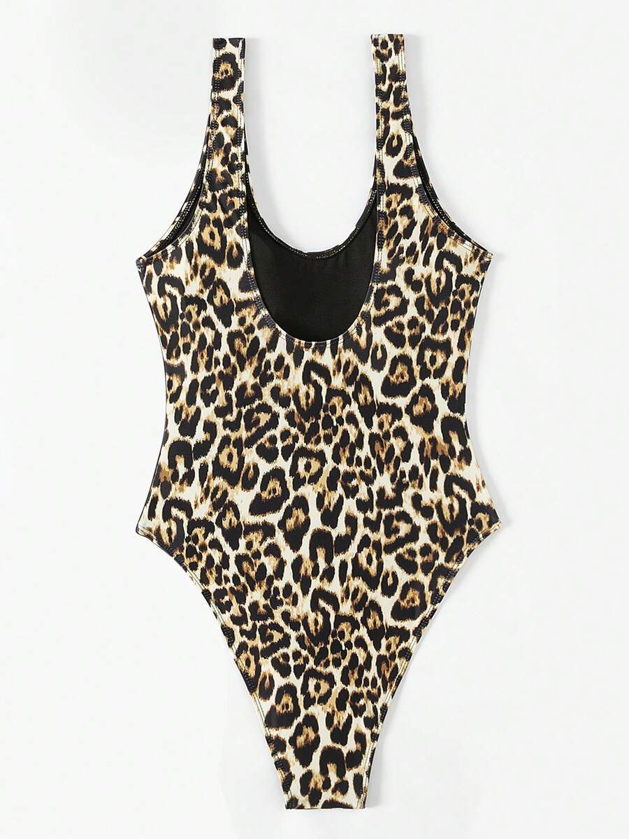 Women's solid color one-piece swimsuit featuring a backless scoop neck design and high cut fit