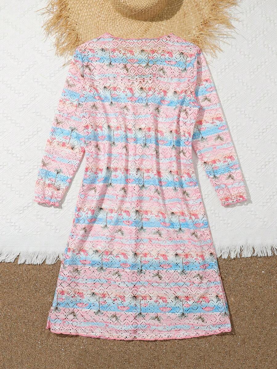 Tween girls' multicolor palm tree print kimono cardigan cover up featuring a button front, long sleeves, and knee-length sheer fabric.