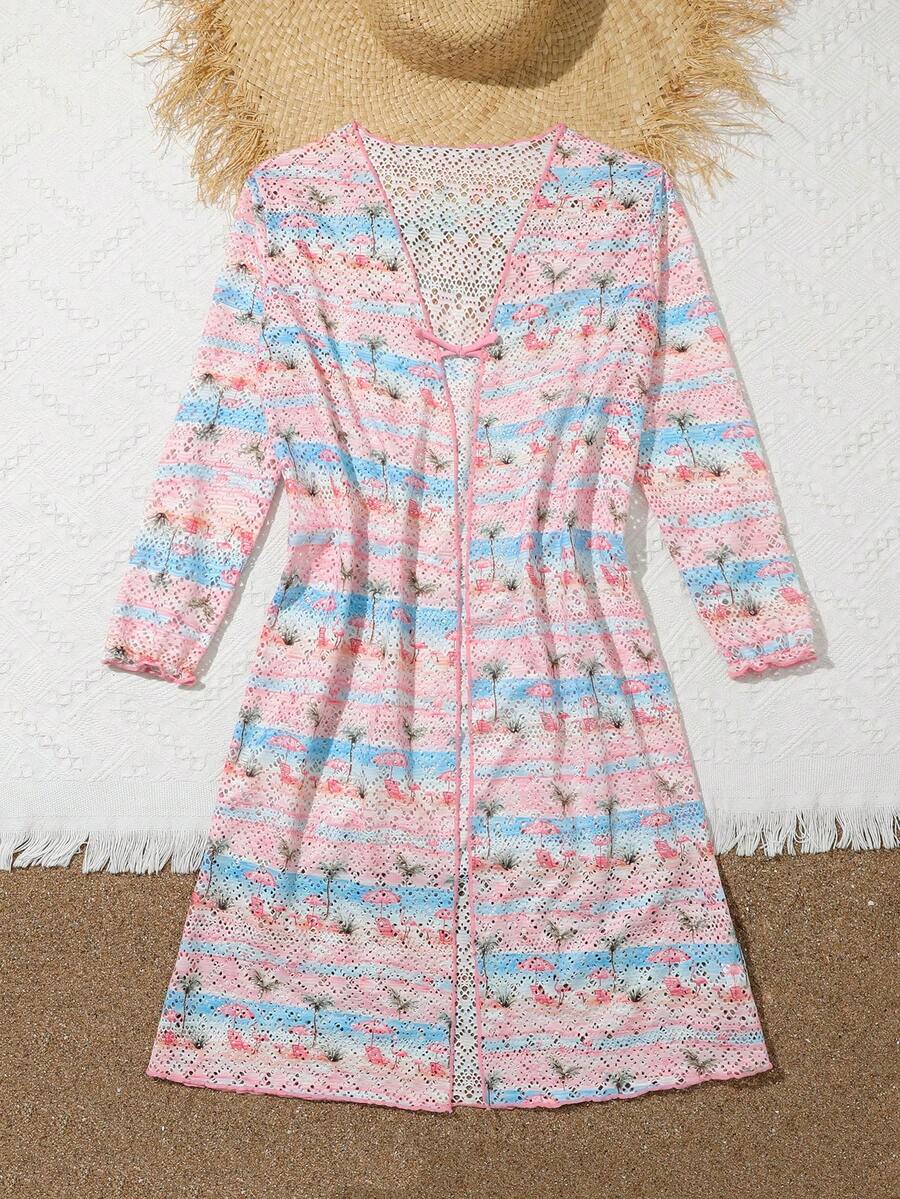 Tween girls' multicolor palm tree print kimono cardigan cover up featuring a button front, long sleeves, and knee-length sheer fabric.