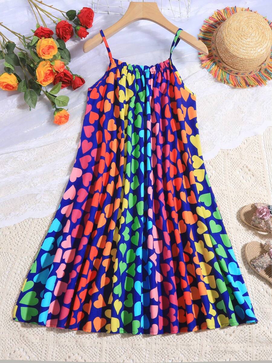 Multicolor geometric print cami midi dress for tween girls featuring spaghetti straps and a flared hem.