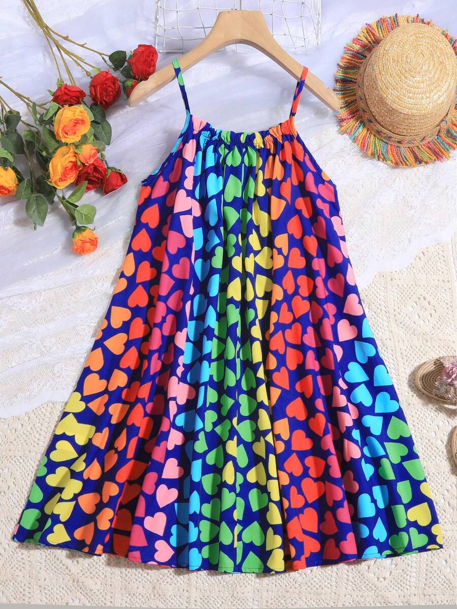 Multicolor geometric print cami midi dress for tween girls featuring spaghetti straps and a flared hem.