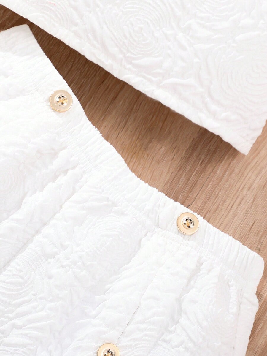 Apricot two-piece summer outfit for tween girls featuring a sleeveless pleated square-neck camisole top with button details and matching gathered shorts.