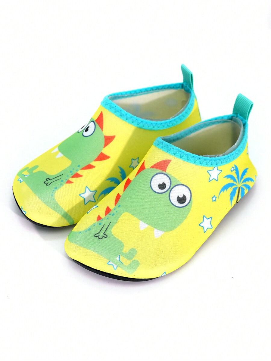 Multicolor cartoon dinosaur kids water shoes with breathable slip-on design and non-slip rubber outsole for boys.