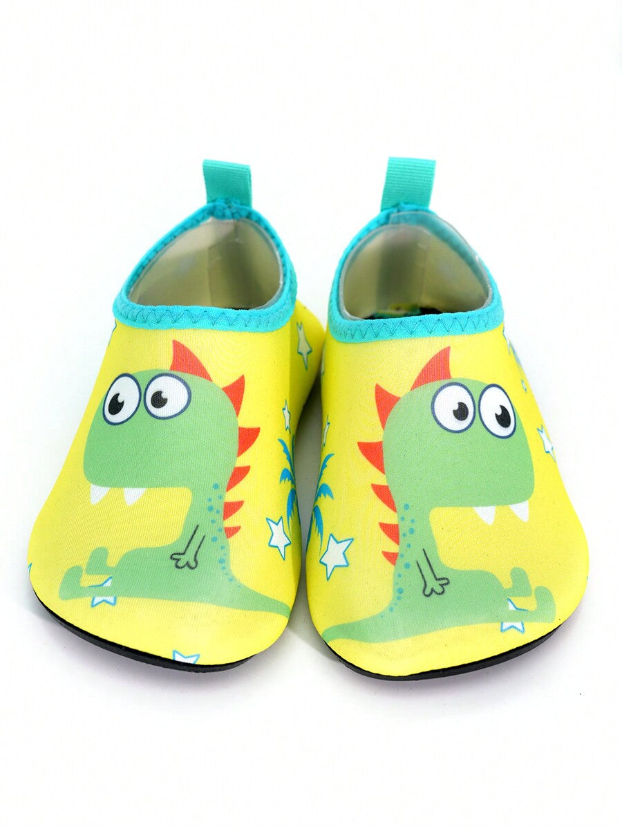 Multicolor cartoon dinosaur kids water shoes with breathable slip-on design and non-slip rubber outsole for boys.