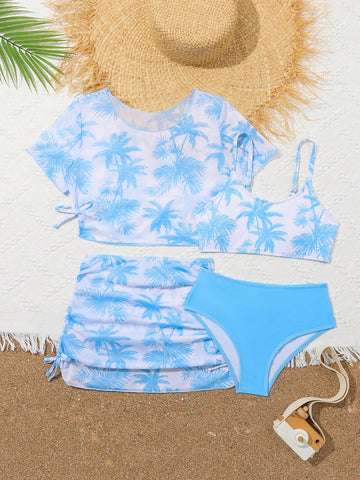 Tween girls 4-piece boho butterfly print bikini set in blue featuring spaghetti strap top, mid waist bottoms, and matching cover-up skirt.