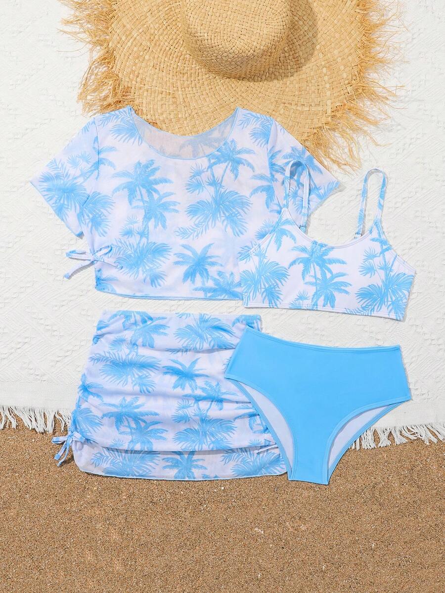Tween girls 4-piece boho butterfly print bikini set in blue featuring spaghetti strap top, mid waist bottoms, and matching cover-up skirt.