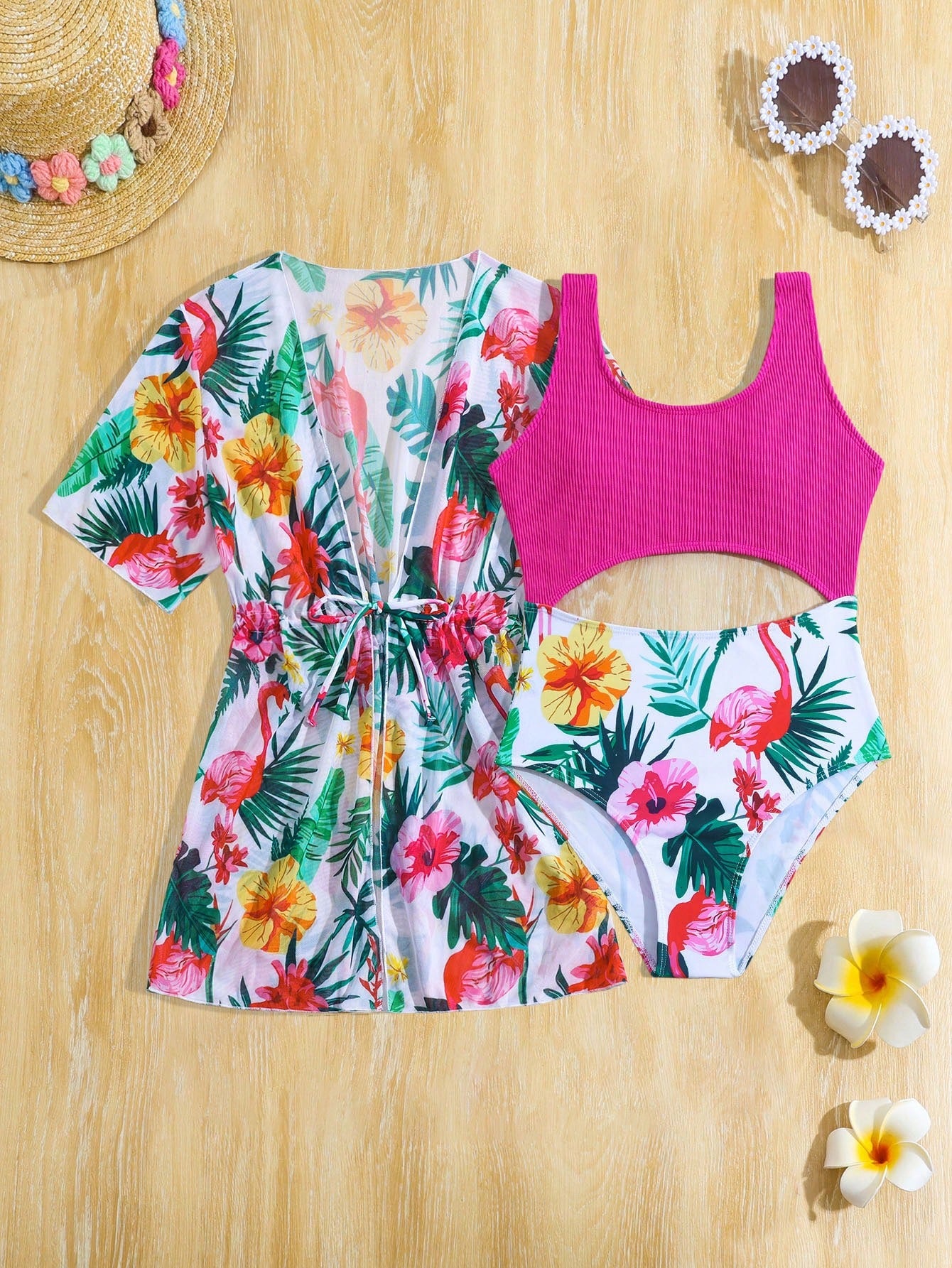 Tween girls multicolor 2-piece swimsuit set with scoop neck, cut-out details, patterned design, shorts-style bottoms, and sheer UV protection cover-up for beach and pool vacations.