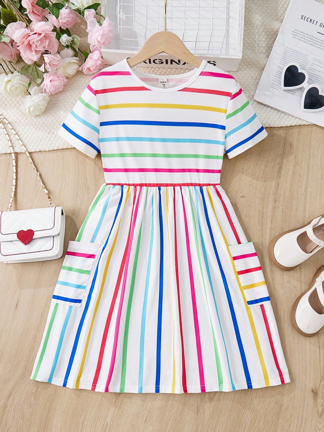 Tween girls casual colorblock short sleeve dress featuring a round neck, high waist flared hem, and button-front details.