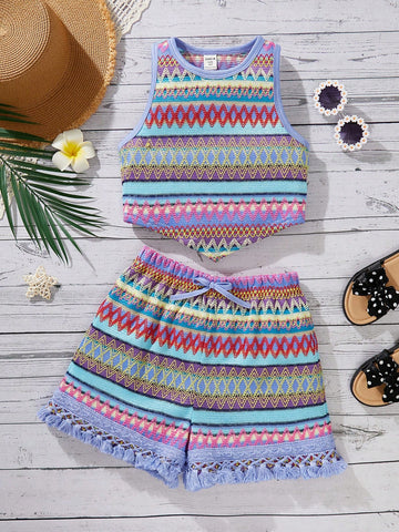 Tween girl wearing a blue boho sleeveless round neck tank top and matching printed shorts set with cable knit detailing.
