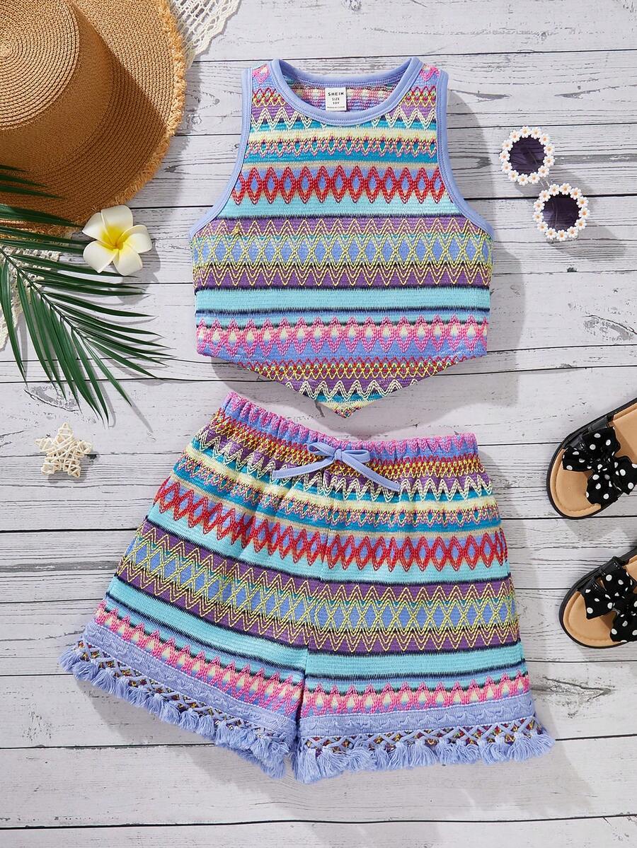 Tween girl wearing a blue boho sleeveless round neck tank top and matching printed shorts set with cable knit detailing.