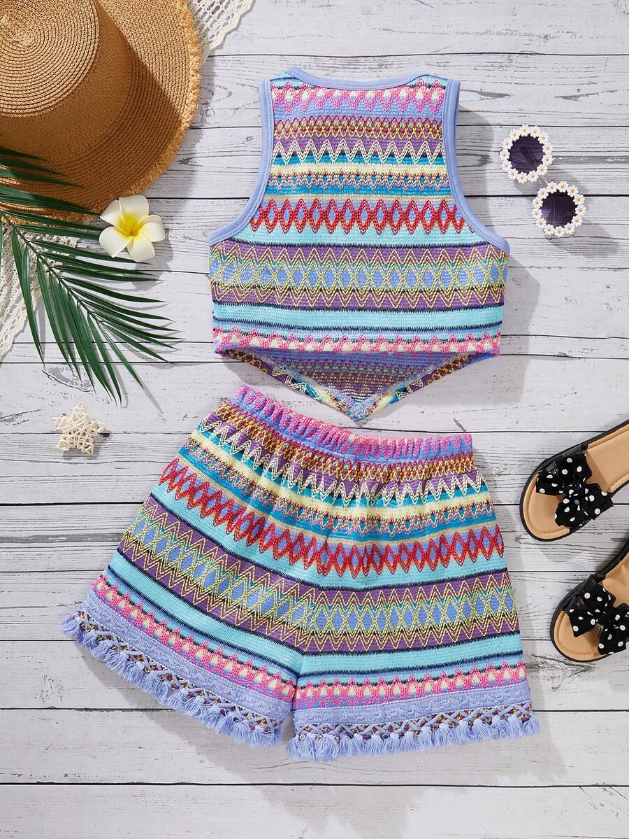 Tween girl wearing a blue boho sleeveless round neck tank top and matching printed shorts set with cable knit detailing.