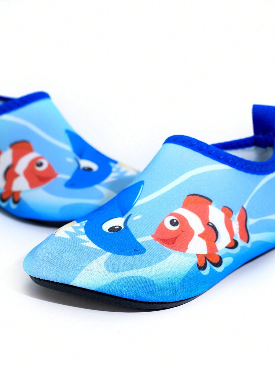 Multicolor cartoon pattern boys' aqua socks with breathable polyester upper, slip-on closure, and non-slip TPR outsole.
