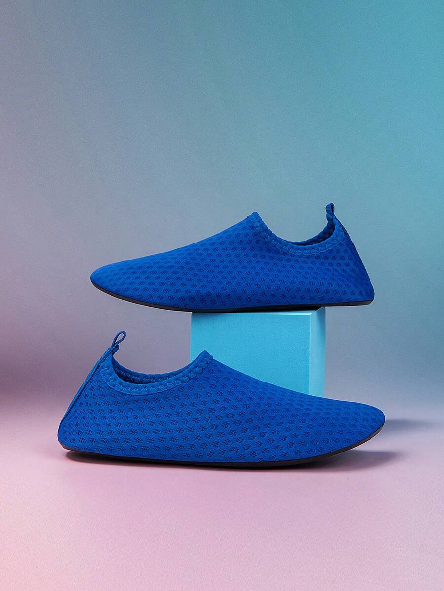 Boys black plain aqua socks featuring a slip-on rib-knit design, breathable fabric upper, mesh insole, and non-slip TPR outsole.