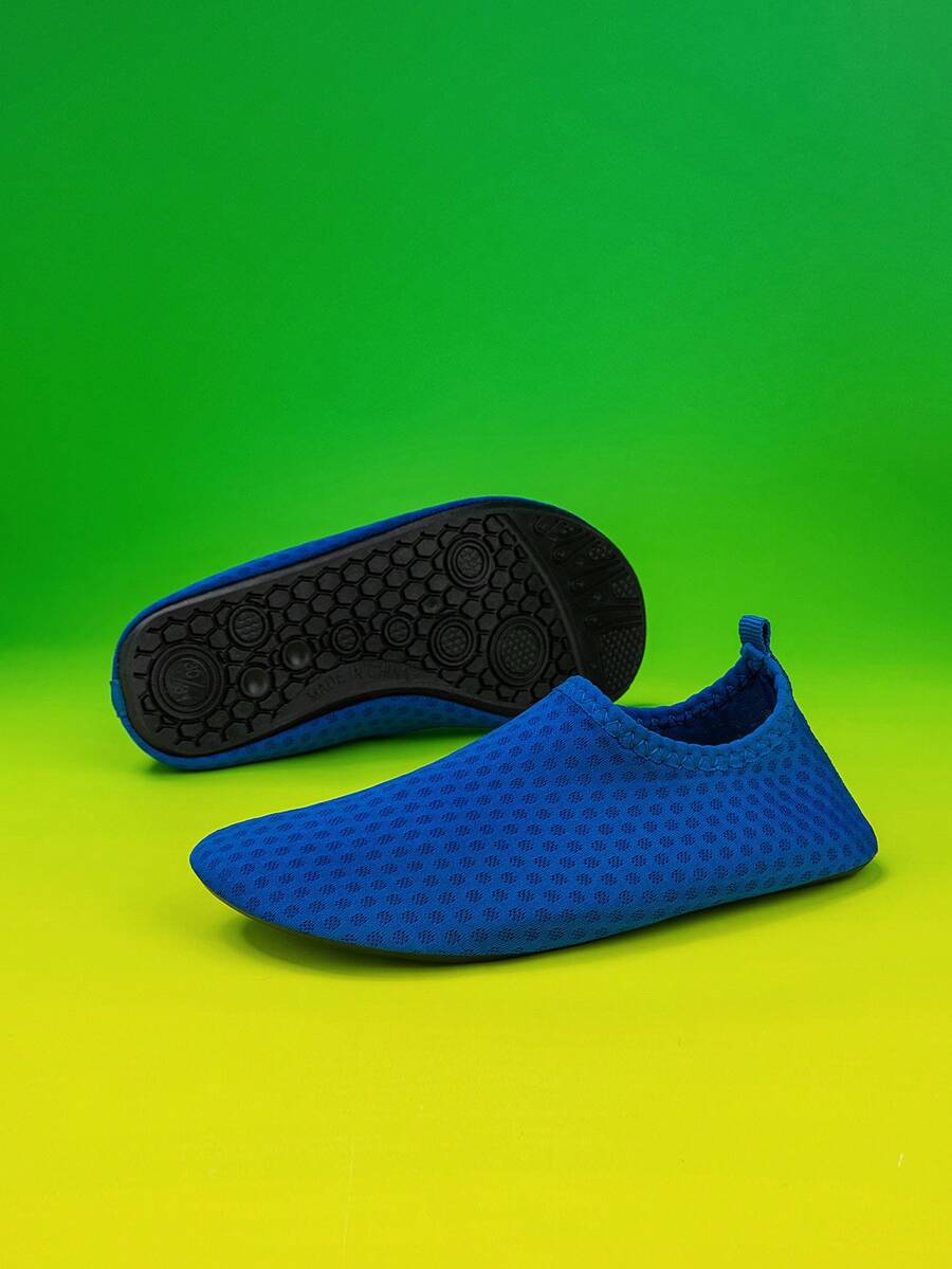 Boys black plain aqua socks featuring a slip-on rib-knit design, breathable fabric upper, mesh insole, and non-slip TPR outsole.