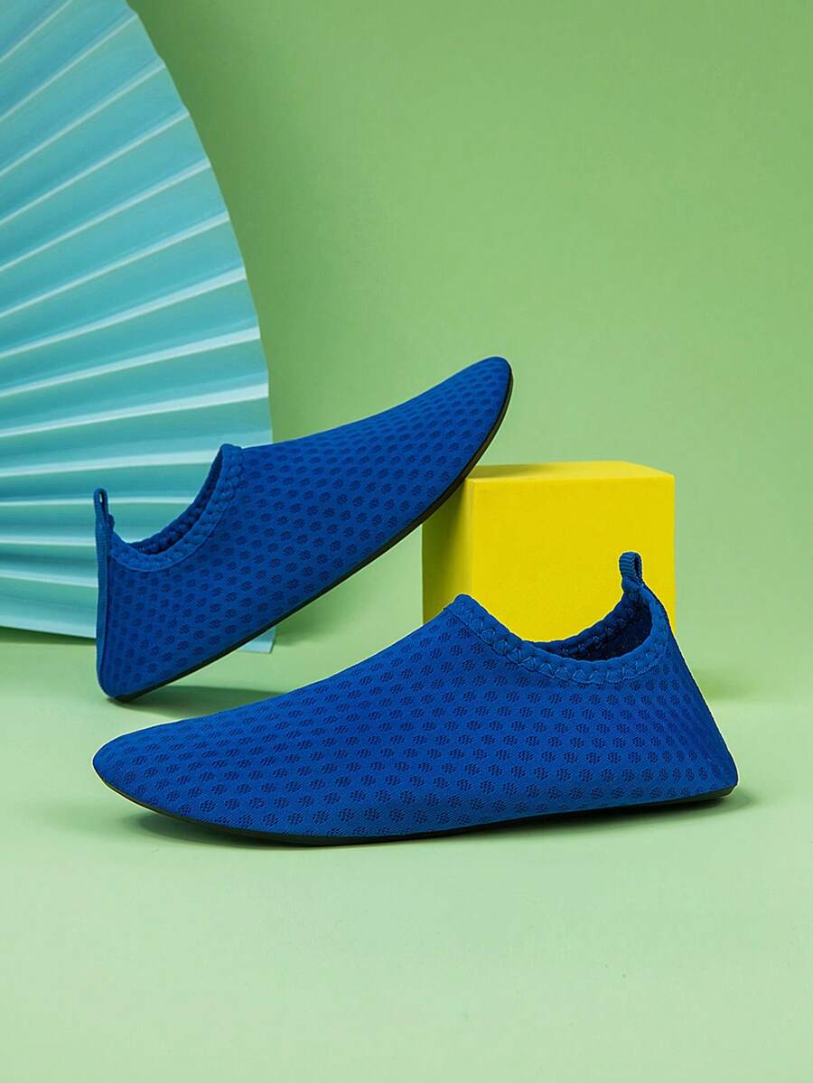 Boys black plain aqua socks featuring a slip-on rib-knit design, breathable fabric upper, mesh insole, and non-slip TPR outsole.