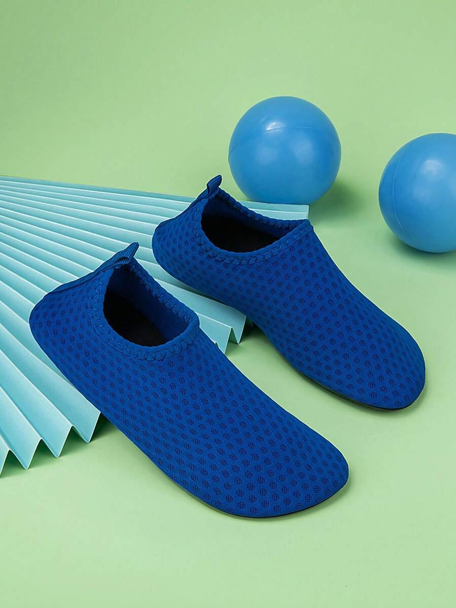 Boys black plain aqua socks featuring a slip-on rib-knit design, breathable fabric upper, mesh insole, and non-slip TPR outsole.
