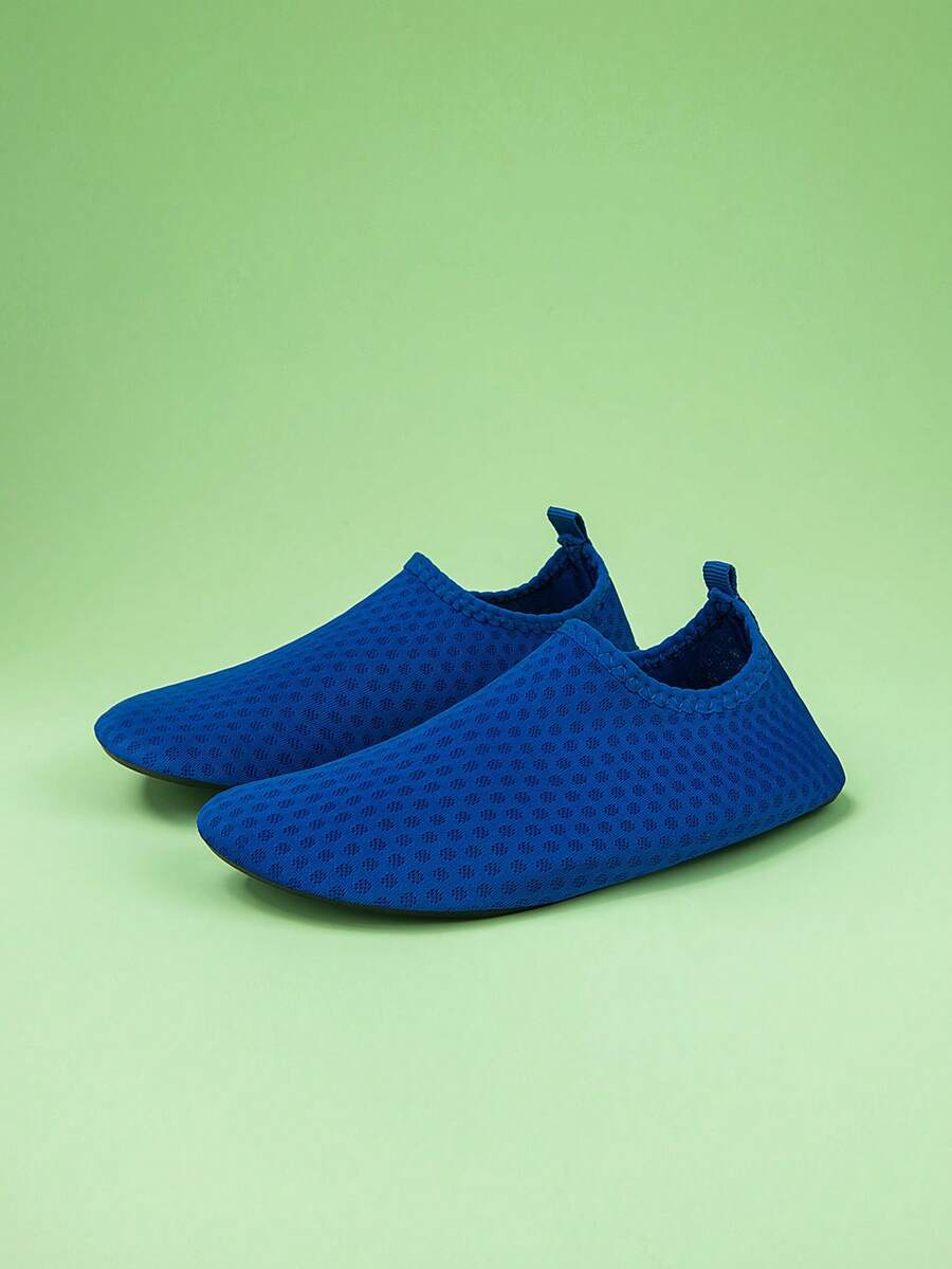 Boys black plain aqua socks featuring a slip-on rib-knit design, breathable fabric upper, mesh insole, and non-slip TPR outsole.