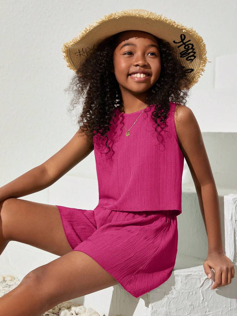 Tween girls army green casual outfit featuring a sleeveless round neck top with button details paired with matching woven loose shorts.