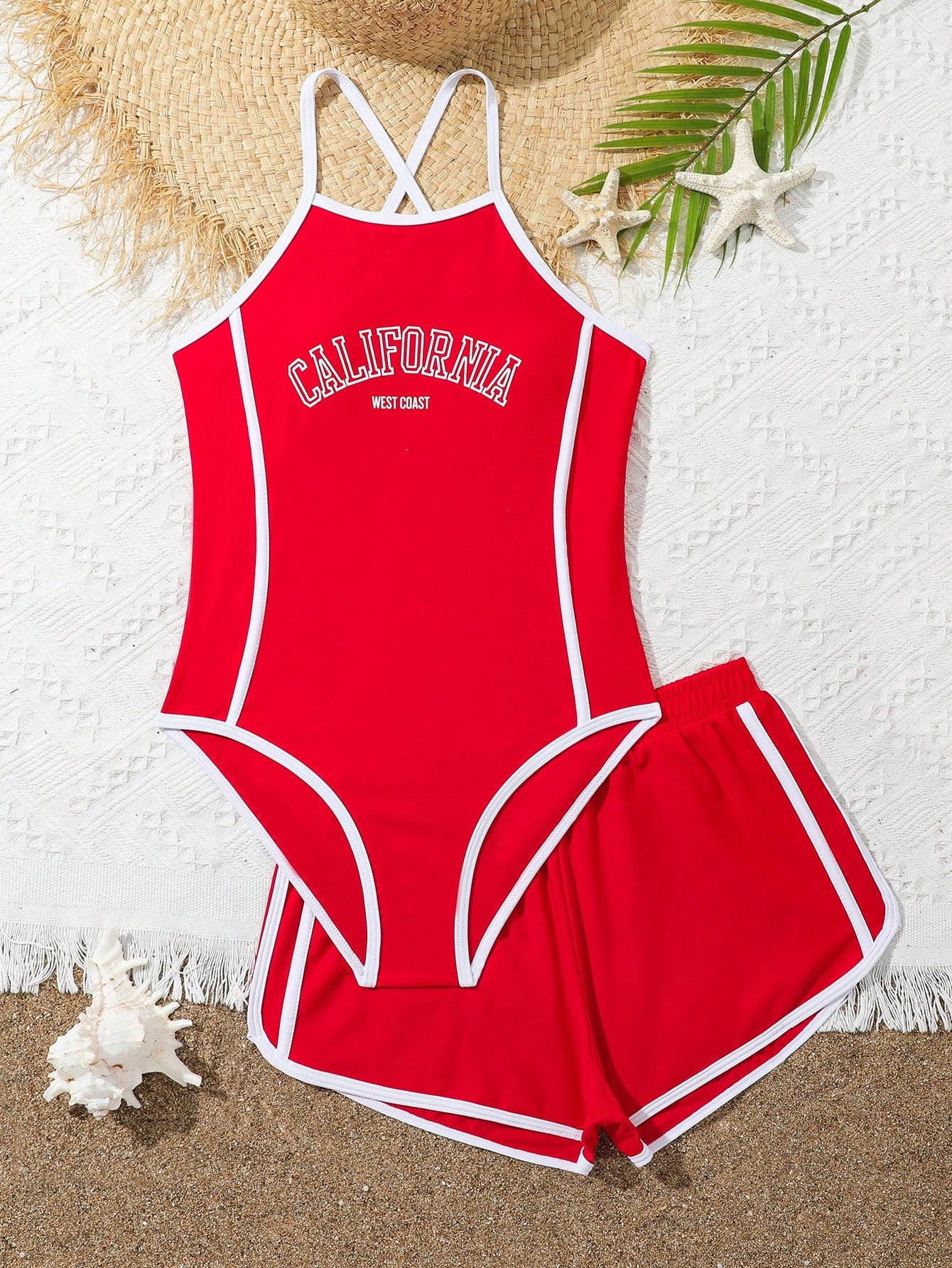 Girls' mauve purple one-piece swimsuit with swim shorts, spaghetti straps, contrast piping, letter pattern, and sleeveless vacation swimwear design.