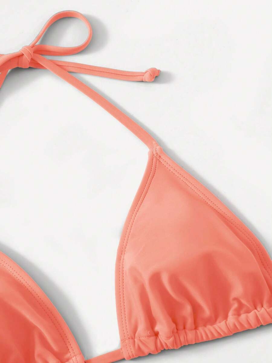 Women's high waist halter tie bikini swimwear set featuring triangle cups, wireless bra with removable padding, and tie side bottoms.