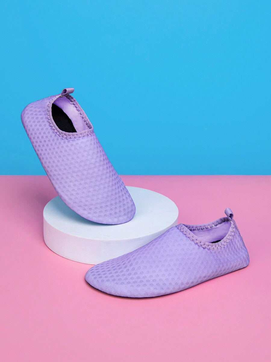 Boys black plain aqua socks featuring a slip-on rib-knit design, breathable fabric upper, mesh insole, and non-slip TPR outsole.