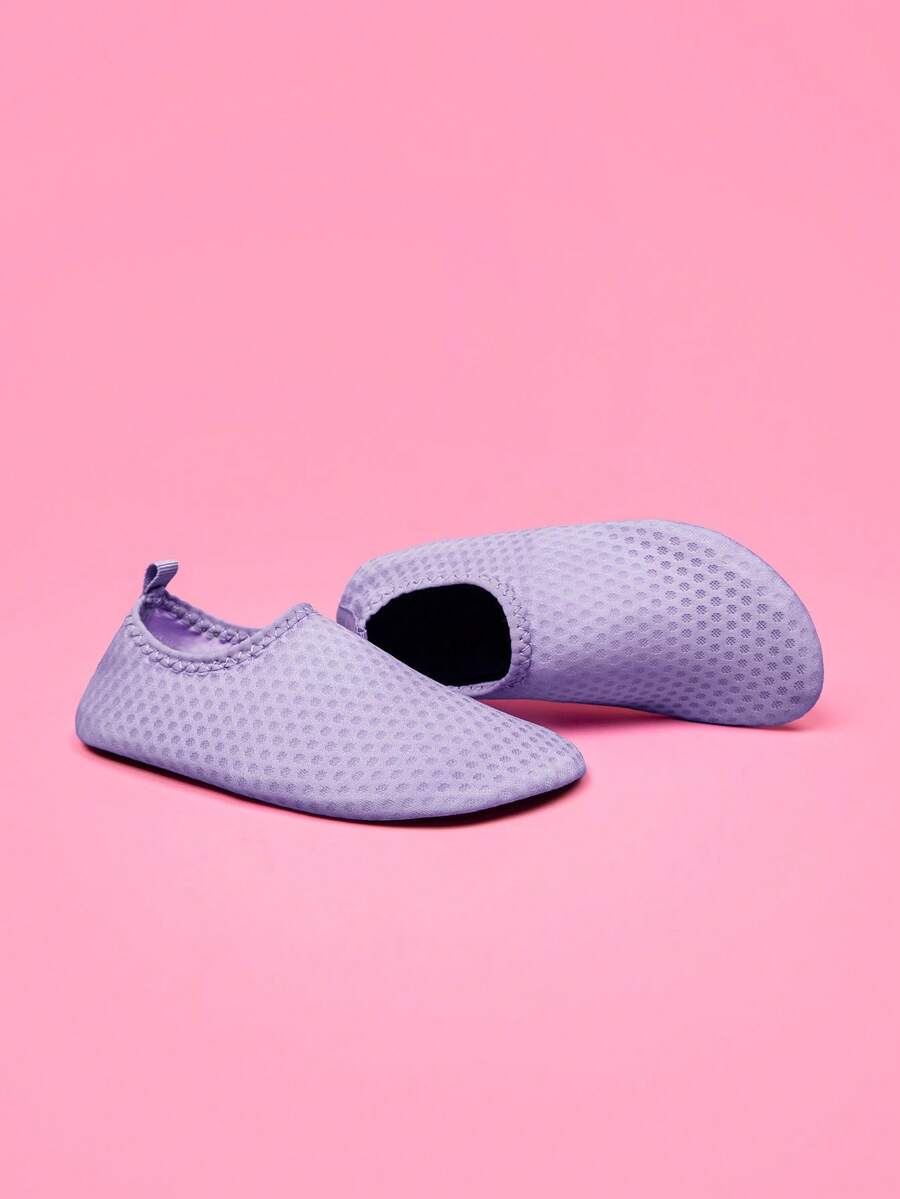 Boys black plain aqua socks featuring a slip-on rib-knit design, breathable fabric upper, mesh insole, and non-slip TPR outsole.