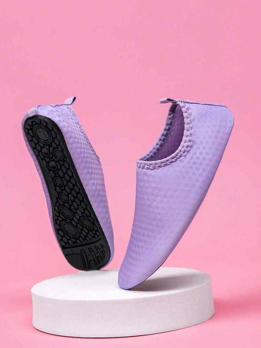 Boys black plain aqua socks featuring a slip-on rib-knit design, breathable fabric upper, mesh insole, and non-slip TPR outsole.