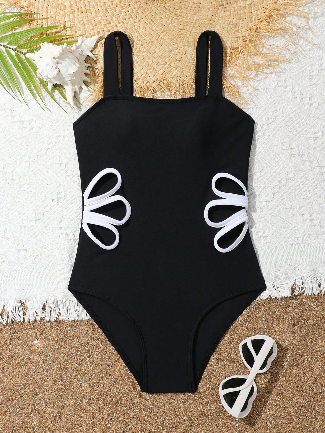 Tween girl multicolor ombre one-piece swimsuit with spaghetti straps, all-over print, lined body, and vacation beachwear style.