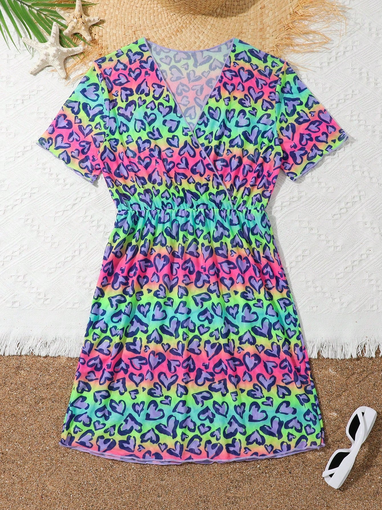 Multicolor heart print long cover up dress for tween girls featuring a V-neck criss-cross wrap front and short sleeves.