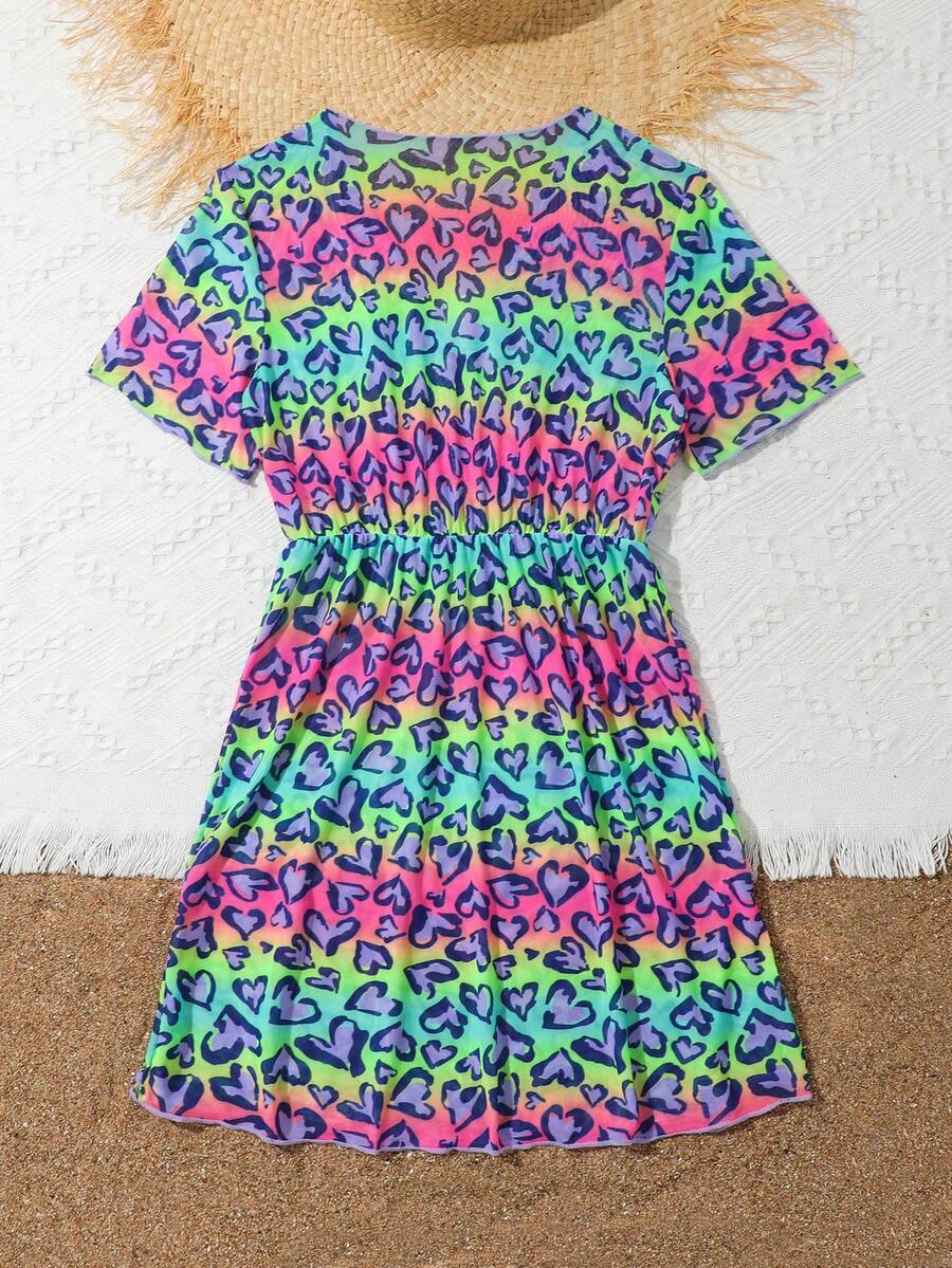 Multicolor heart print long cover up dress for tween girls featuring a V-neck criss-cross wrap front and short sleeves.