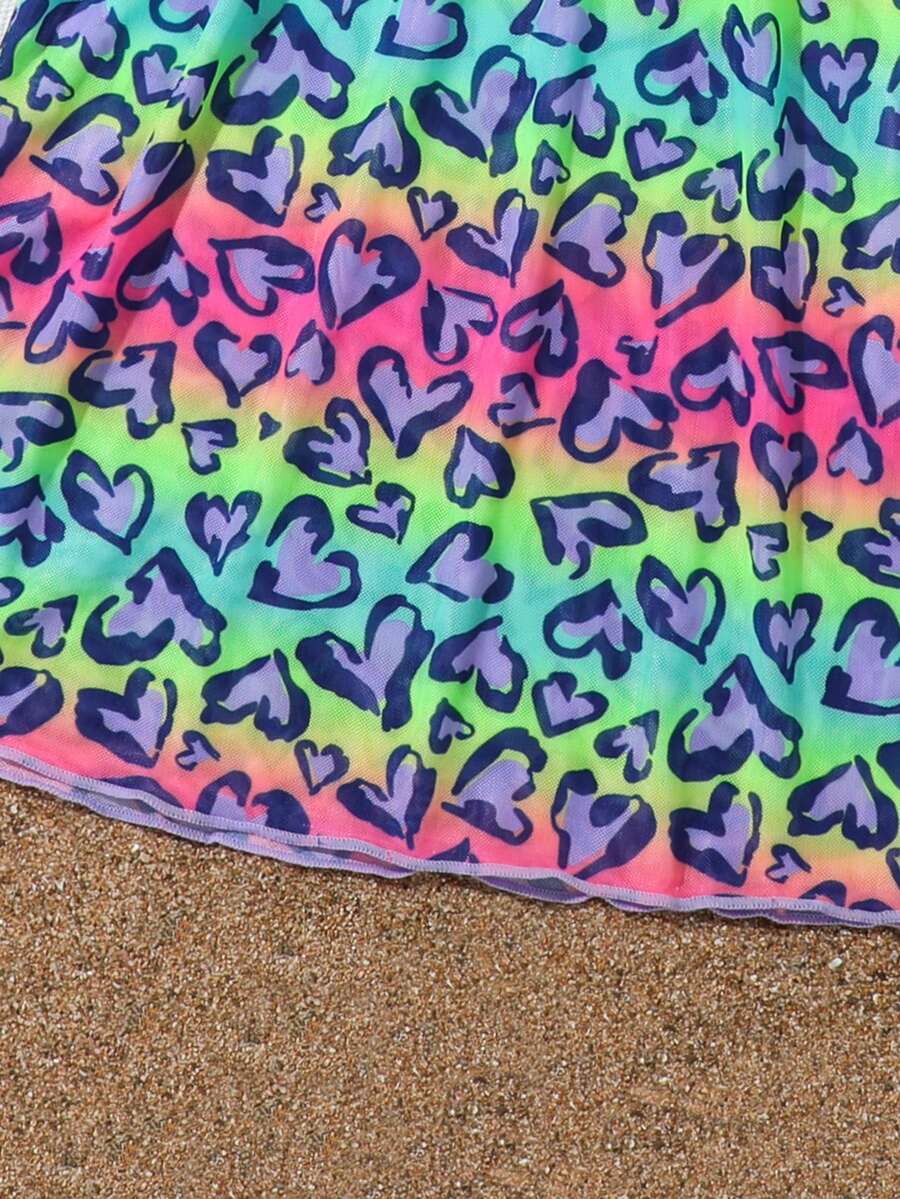 Multicolor heart print long cover up dress for tween girls featuring a V-neck criss-cross wrap front and short sleeves.