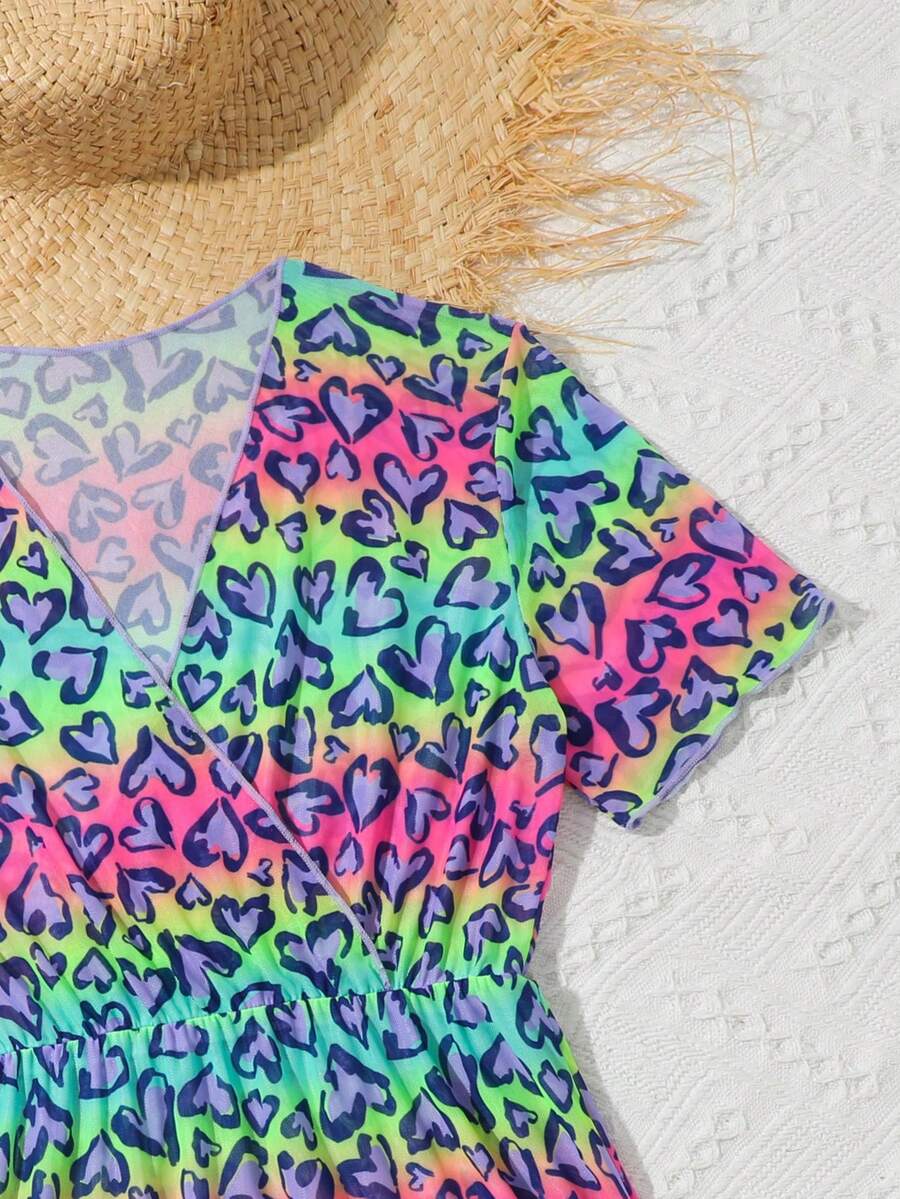 Multicolor heart print long cover up dress for tween girls featuring a V-neck criss-cross wrap front and short sleeves.